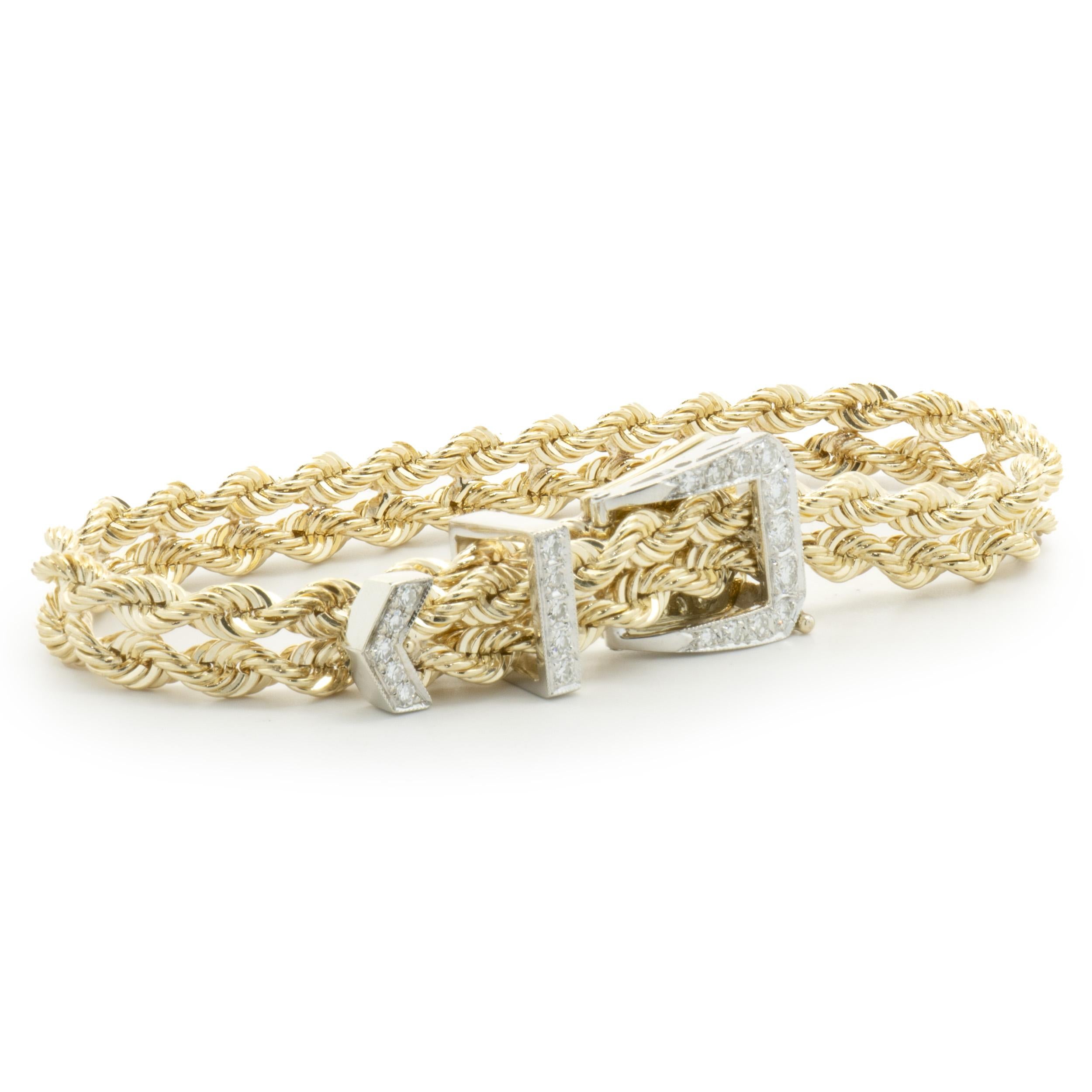Designer: custom design
Material: 14K yellow gold
Diamond: 21 round brilliant cut = 0.50cttw
Color: G
Clarity: VS2
Dimensions: bracelet will fit up to a 8.25-inch wrist
Weight: 26.11 grams
