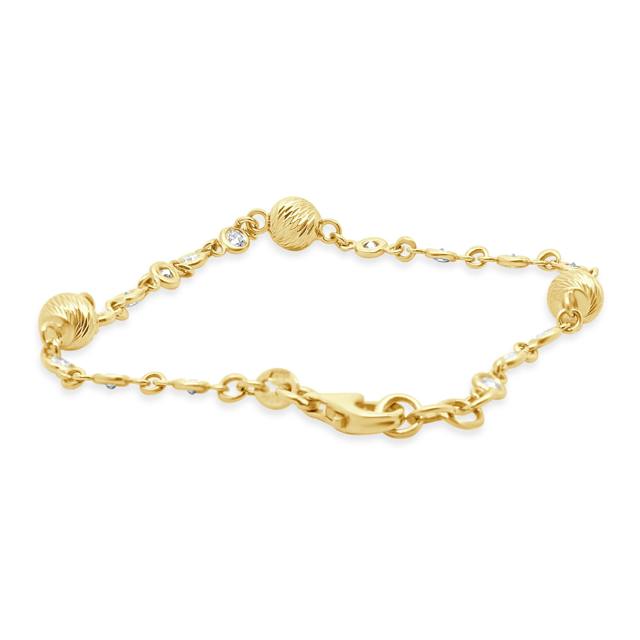 Designer : design personnalisé
Matériau : Or jaune 14K
Diamant : taille ronde = 0,80cttw
Couleur : G
Clarté : SI1
Dimensions : le bracelet convient à un poignet de 6 pouces maximum.
Poids : 4,80 grammes
