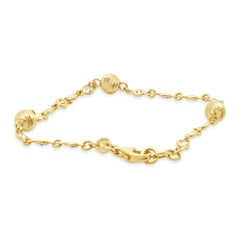 14 Karat Yellow Gold Diamond By The Yard Ball Station Bracelet