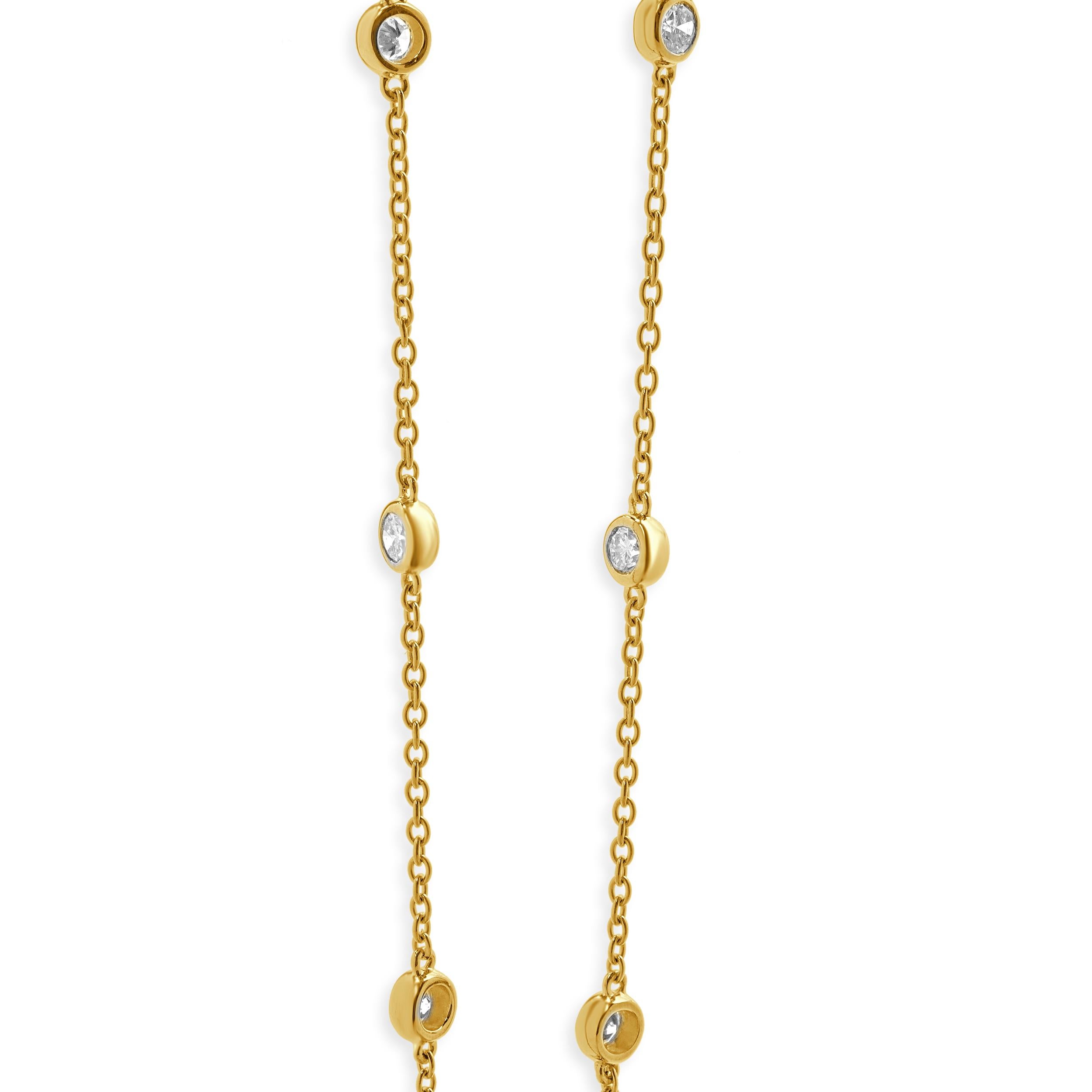 Designer: custom
Material: 14K yellow gold
Diamonds: 10 round cut = 0.75ct
Color: G
Clarity: SI1
Dimensions: necklace measures 16-18 inches in length 
Weight: 3.70 grams
