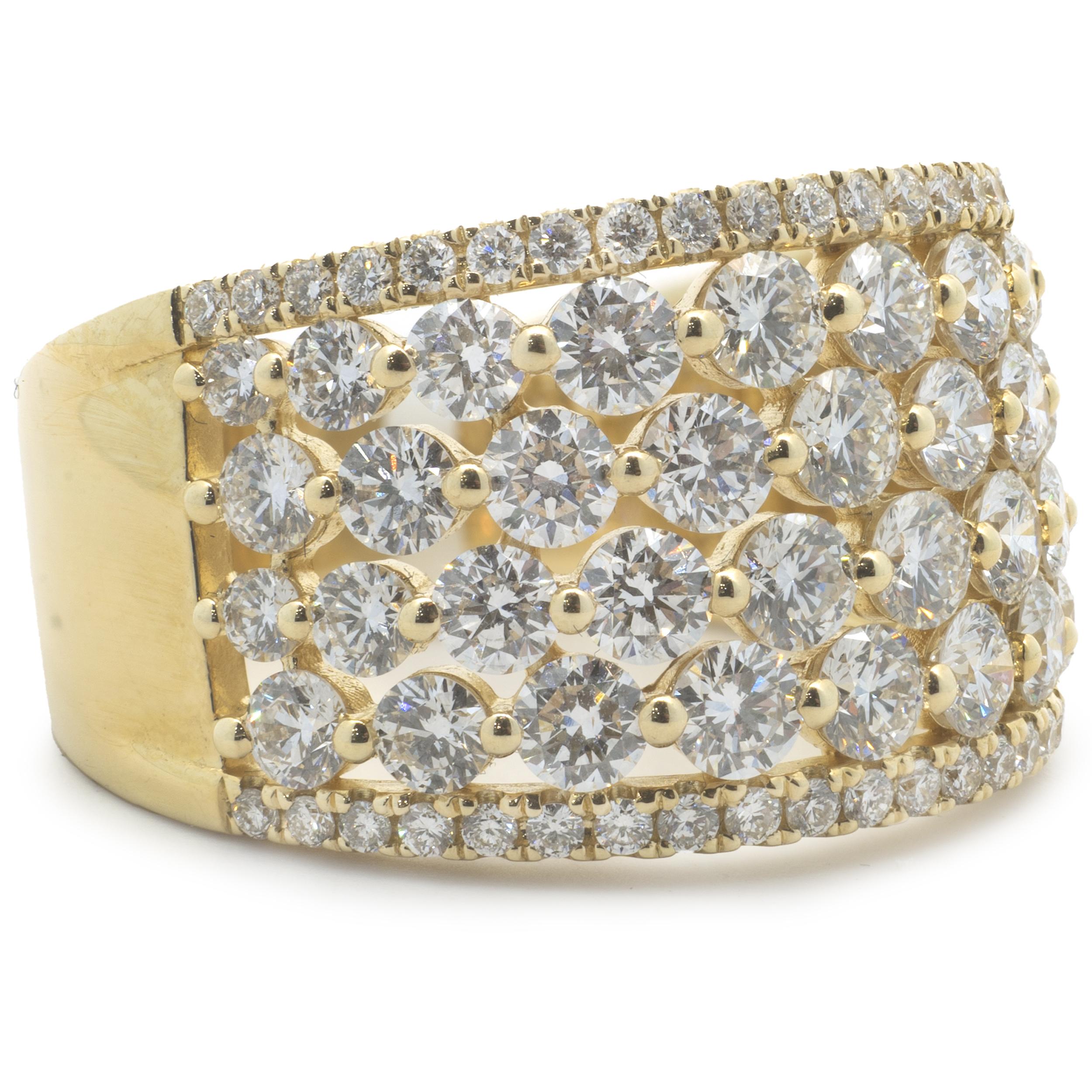 Designer: custom
Material: 14K yellow gold
Diamond: 80 round brilliant cut = 2.47cttw
Color: G
Clarity: SI1
Ring size: 6.5 (please allow two additional shipping days for sizing requests)
Weight:  7.21 grams

