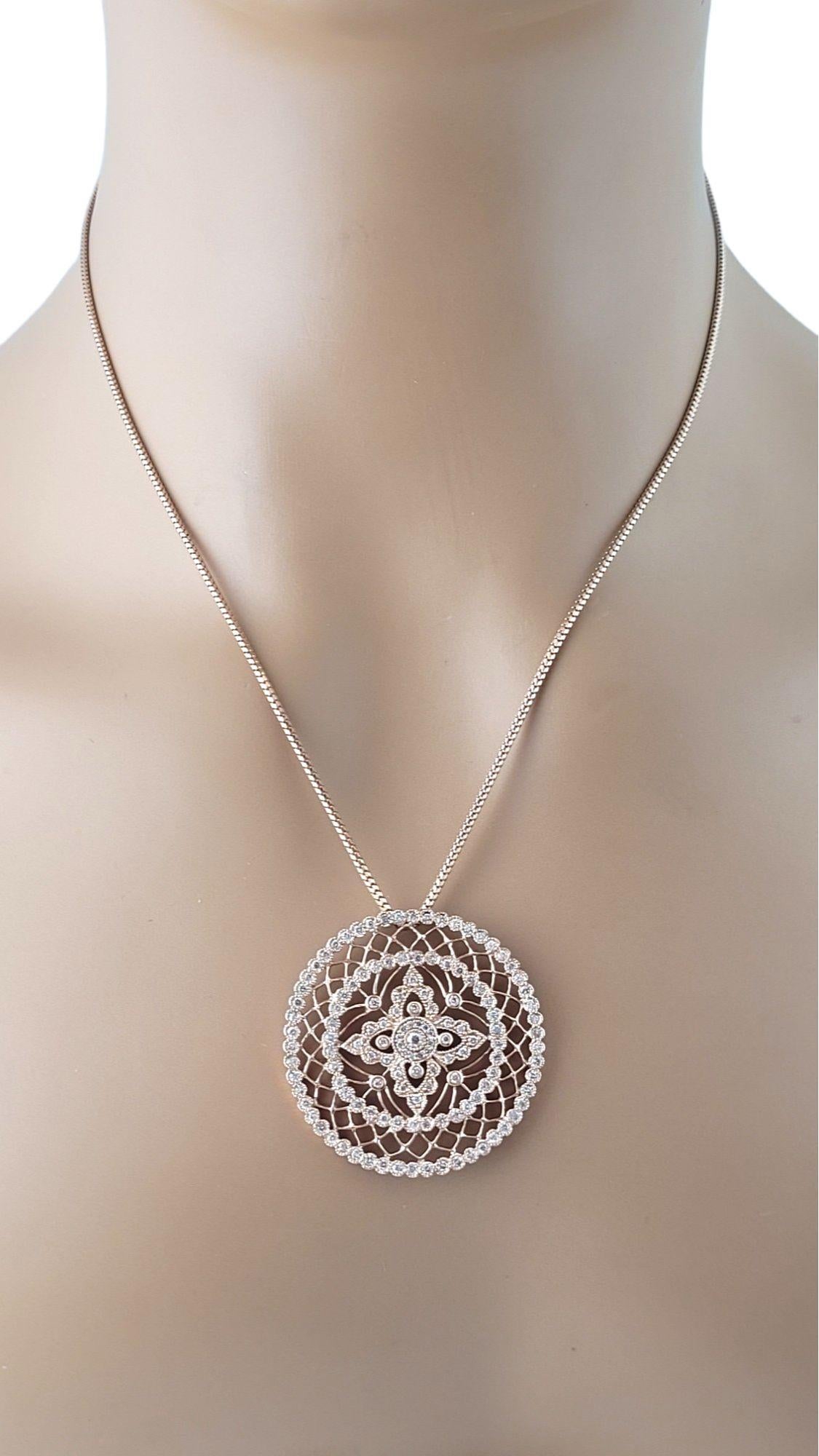 Vintage 14 Karat Rose22 Gold Diamond Pendant Necklace-

This fabulous piece will make any ensemble a showstopper!

Beautiful rose gold chain and pendant featuring 131 round brilliant cut diamonds set in exquisitely designed 14K gold.

Approximate