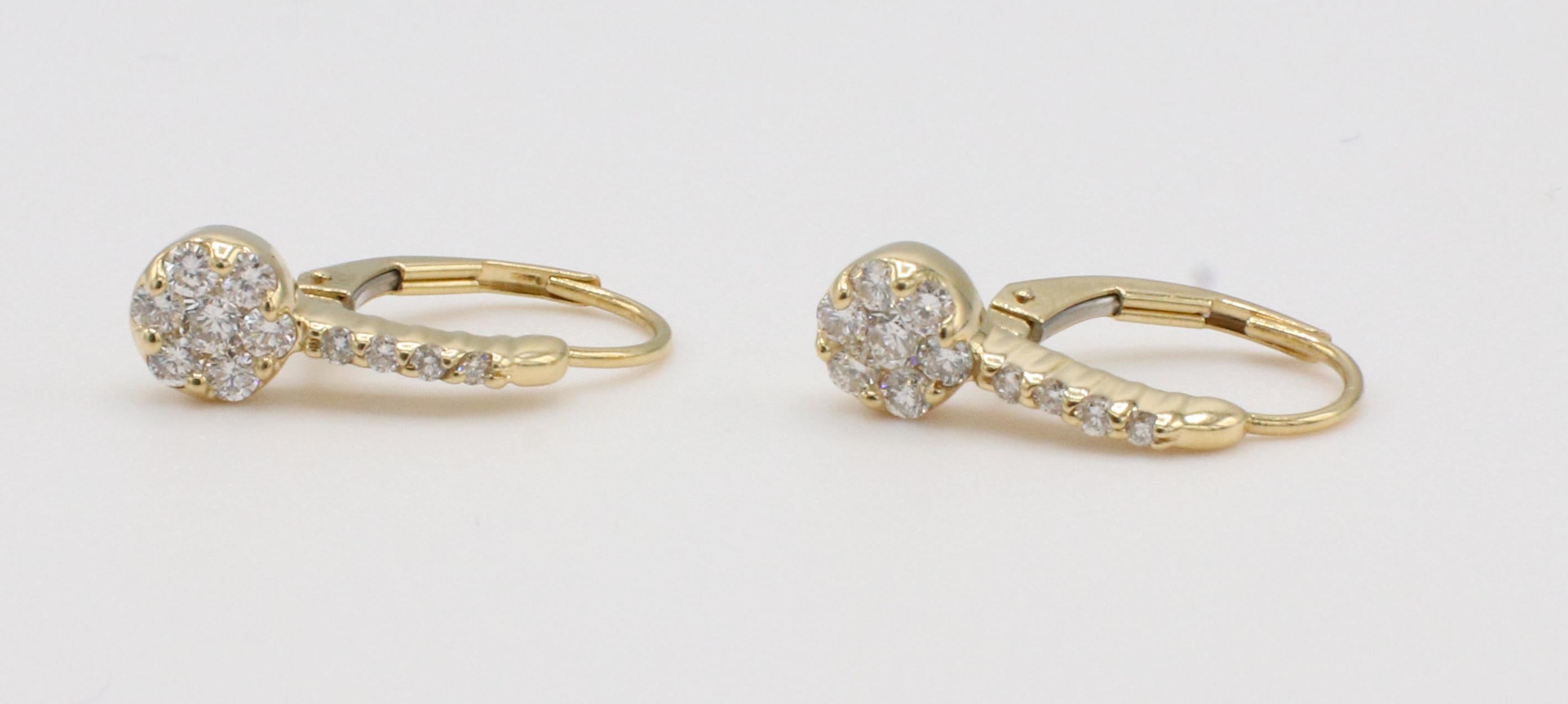 14 Karat Yellow Gold Natural Diamond Cluster Drop Earrings 
Metal: 14k yellow gold
Weight: 1.93 grams
Diamonds: Approx. .32 carats G-H VS round natural diamonds
Length: 14.5mm
Width: 5.5mm