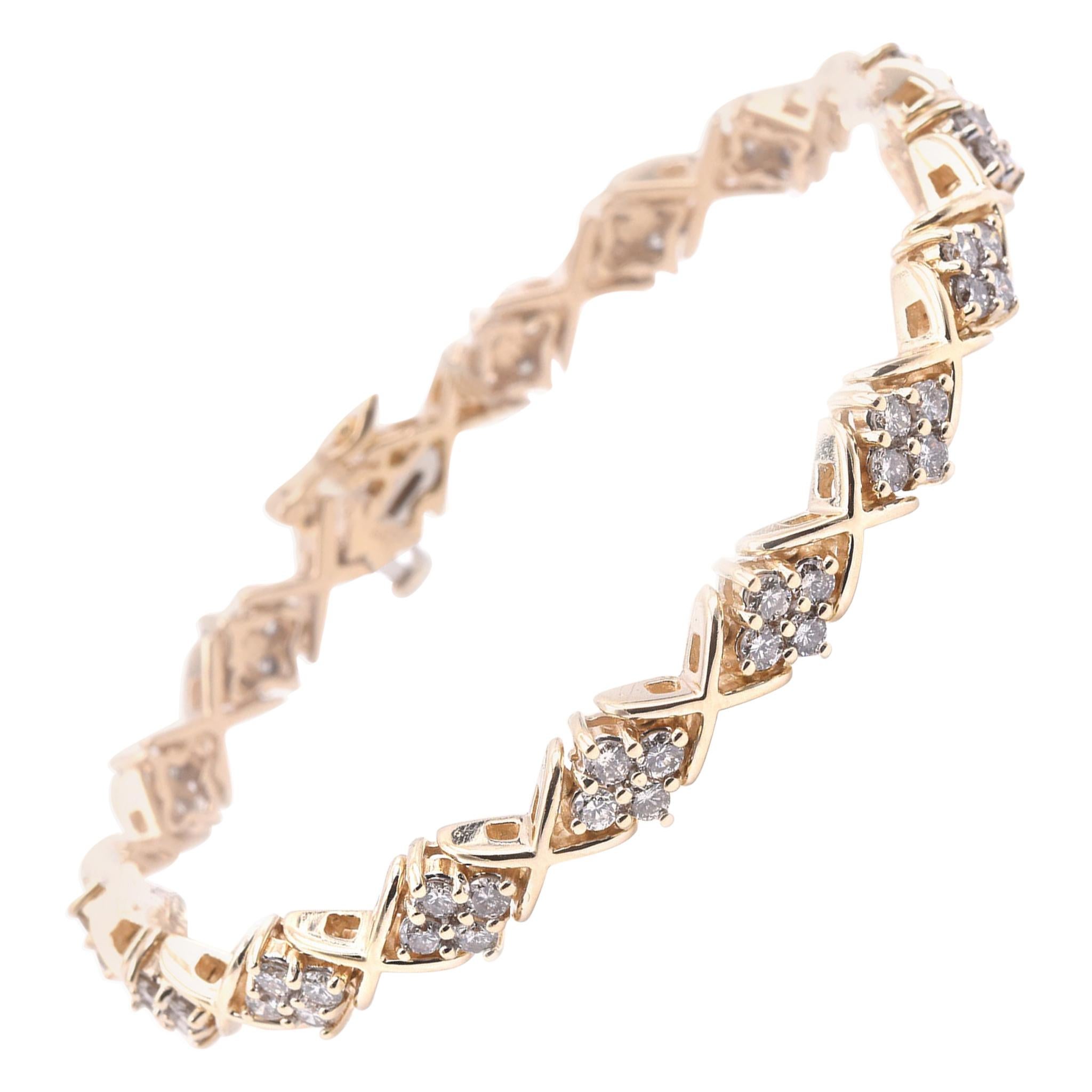 14 Karat Yellow Gold Diamond Cluster X Tennis Bracelet