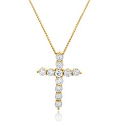 Collier croix en or jaune 14 carats et diamants
