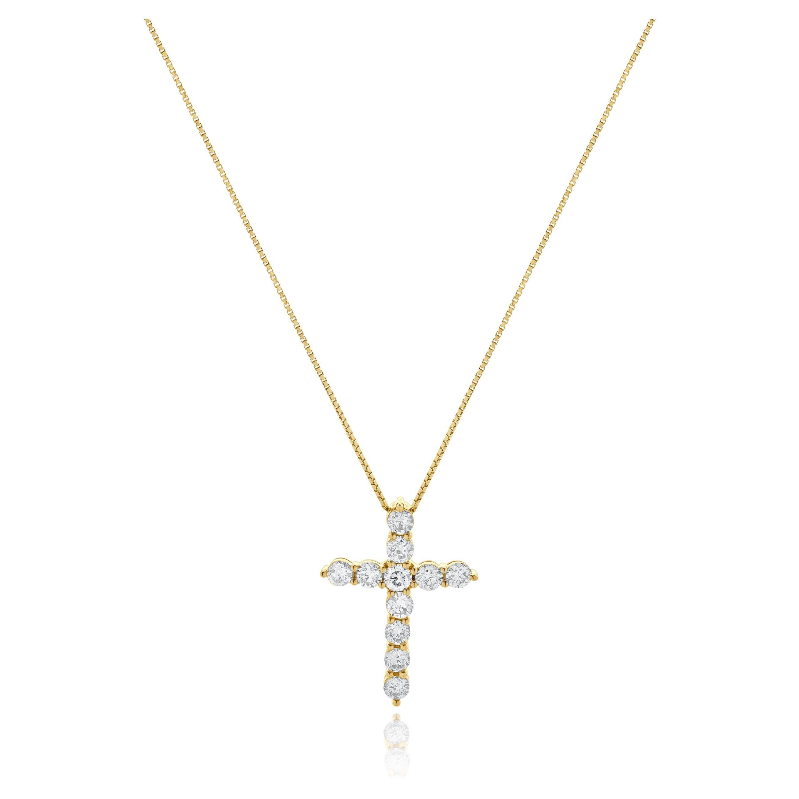 Collier croix en or jaune 14 carats et diamants