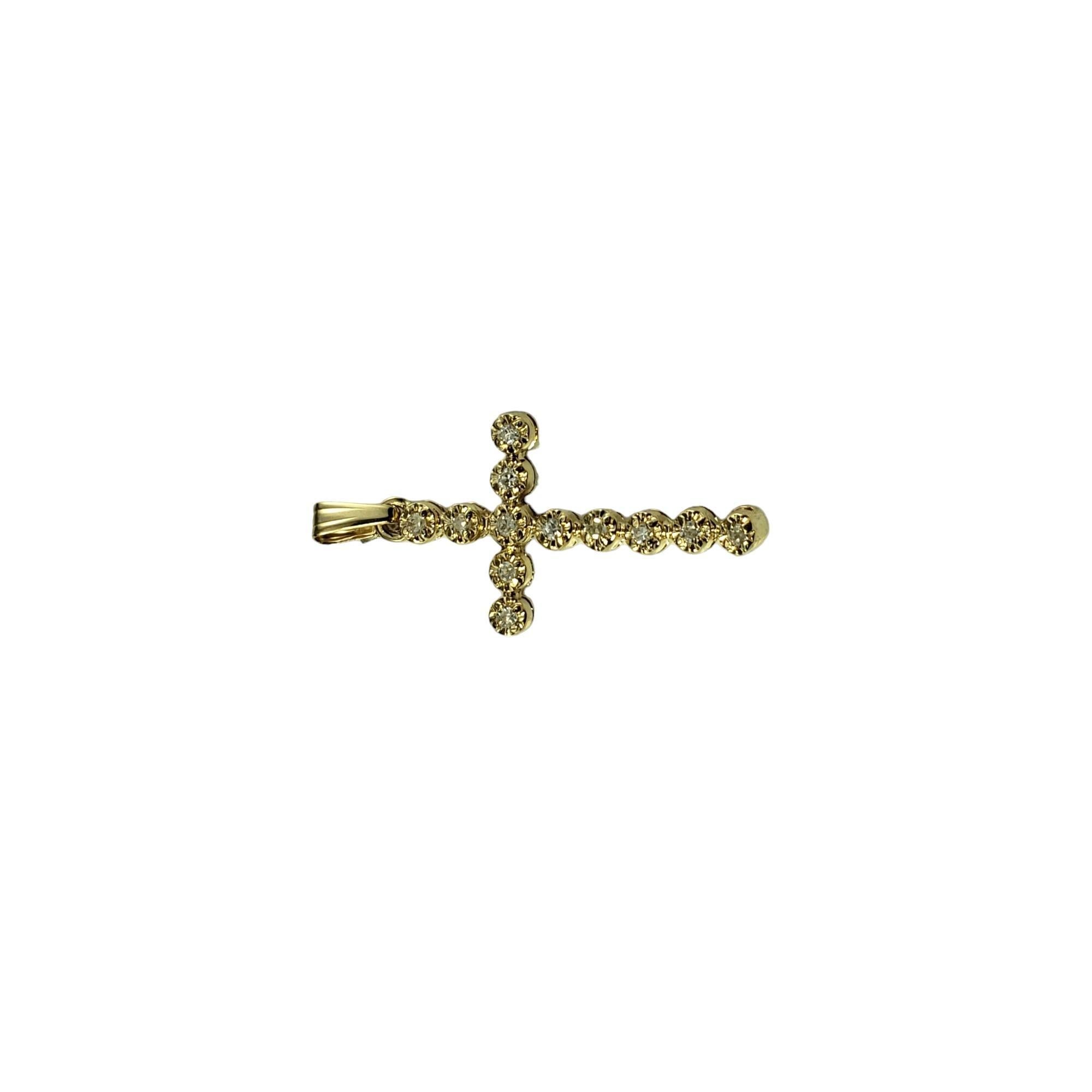 Vintage 14K Yellow Gold Diamond Cross Pendant-

This sparkling pendant features 12 round single cut diamonds set in classic 14K yellow gold.

Approximate total diamond weight: .10 ct.

Diamond color: I

Diamond clarity: I1-I2

Size: 24 mm x 14
