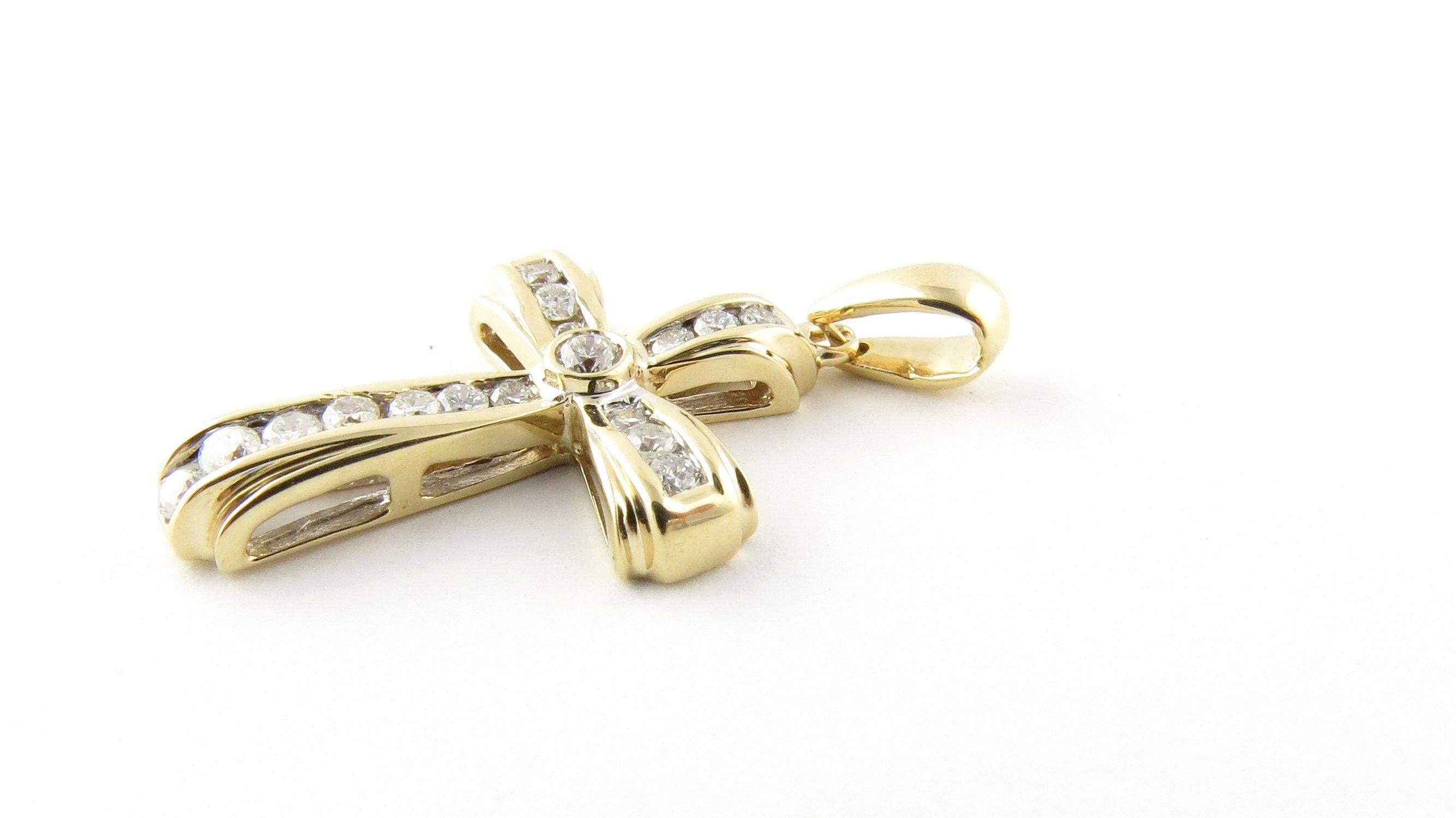 14 karat gold diamond cross pendant