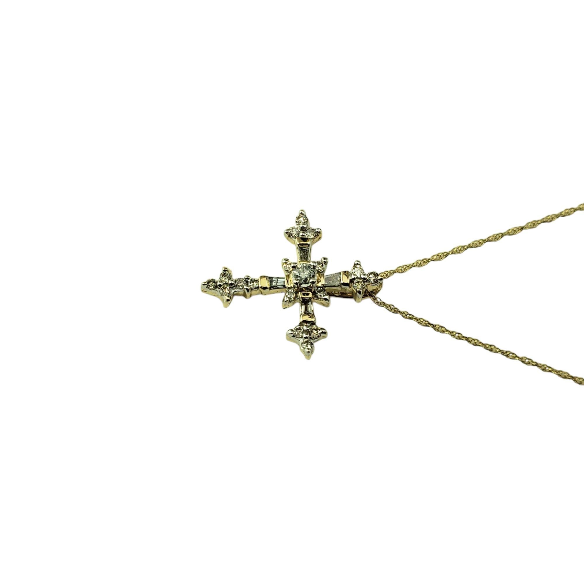 14 Karat Yellow Gold Diamond Cross Pendant Necklace-

This stunning cross pendant features round and baguette cut diamonds set in classic 14K yellow gold suspended from a classic 14K yellow gold chain.

Approximate total diamond weight: .18