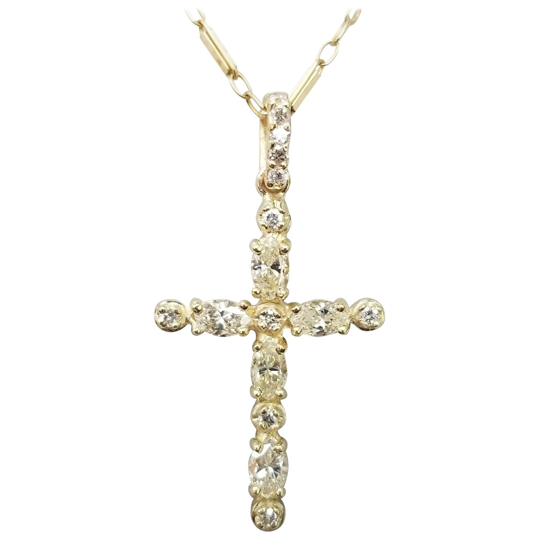 14 Karat Yellow Gold Diamond Cross Total Weight .86pts