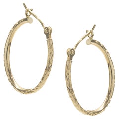 14 Karat Yellow Gold Diamond Cut Hoop Earrings