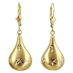 14 Karat Yellow Gold Diamond Cut Starburst Drop Earrings
