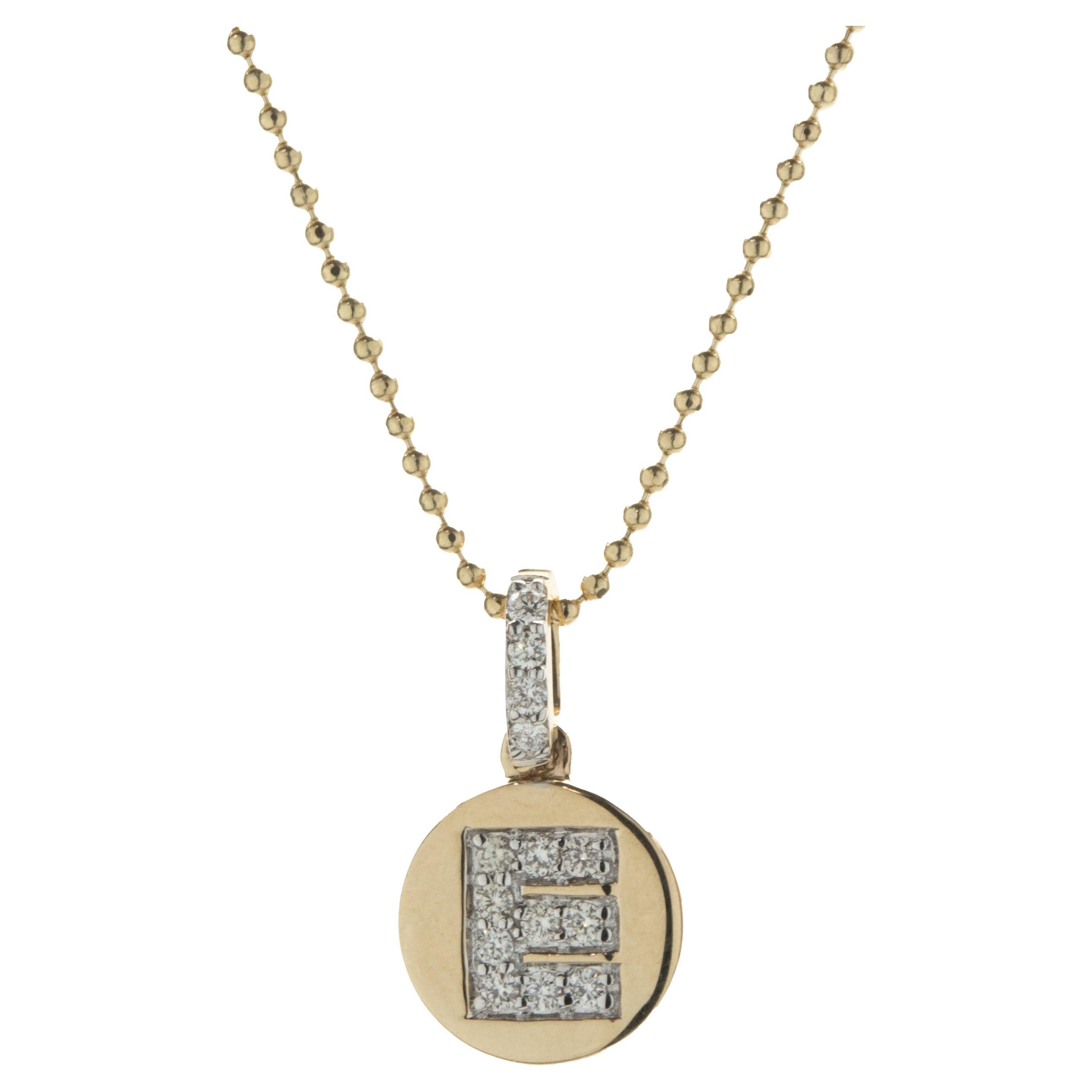 14 Karat Yellow Gold Diamond E Necklace For Sale