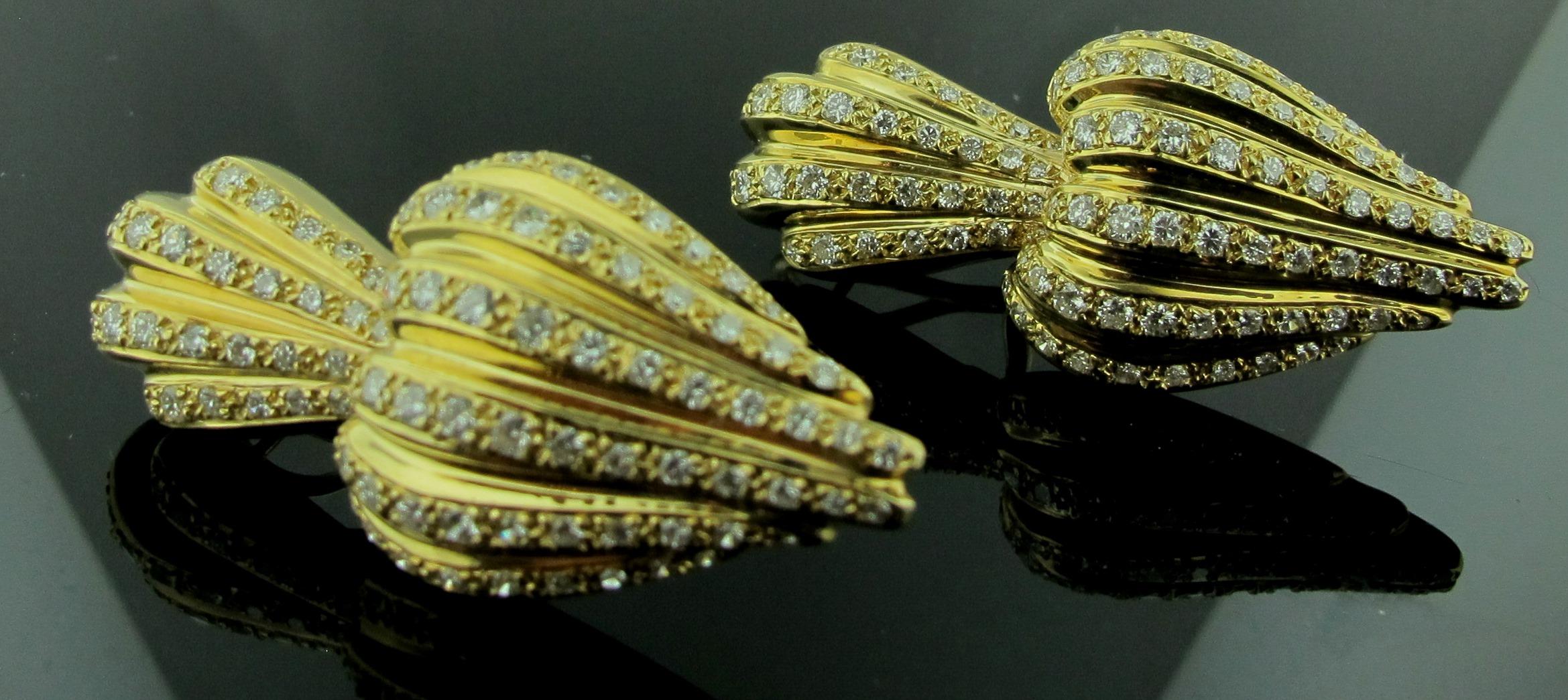 Round Cut 14 Karat Yellow Gold Diamond Earrings For Sale