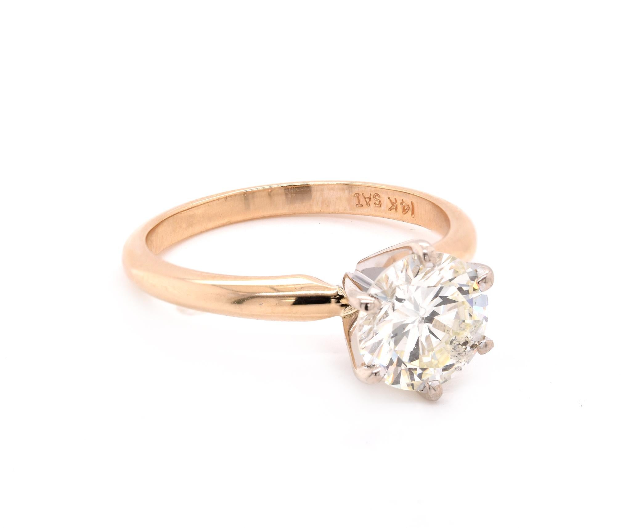Material: 14K yellow gold
Center Diamond: 1 round brilliant cut = 1.64ct
Color: K
Clarity: I1
Ring Size: 7 (please allow up to 2 additional business days for sizing requests)
Dimensions: ring shank measures 2mm
Weight: 3.25 grams