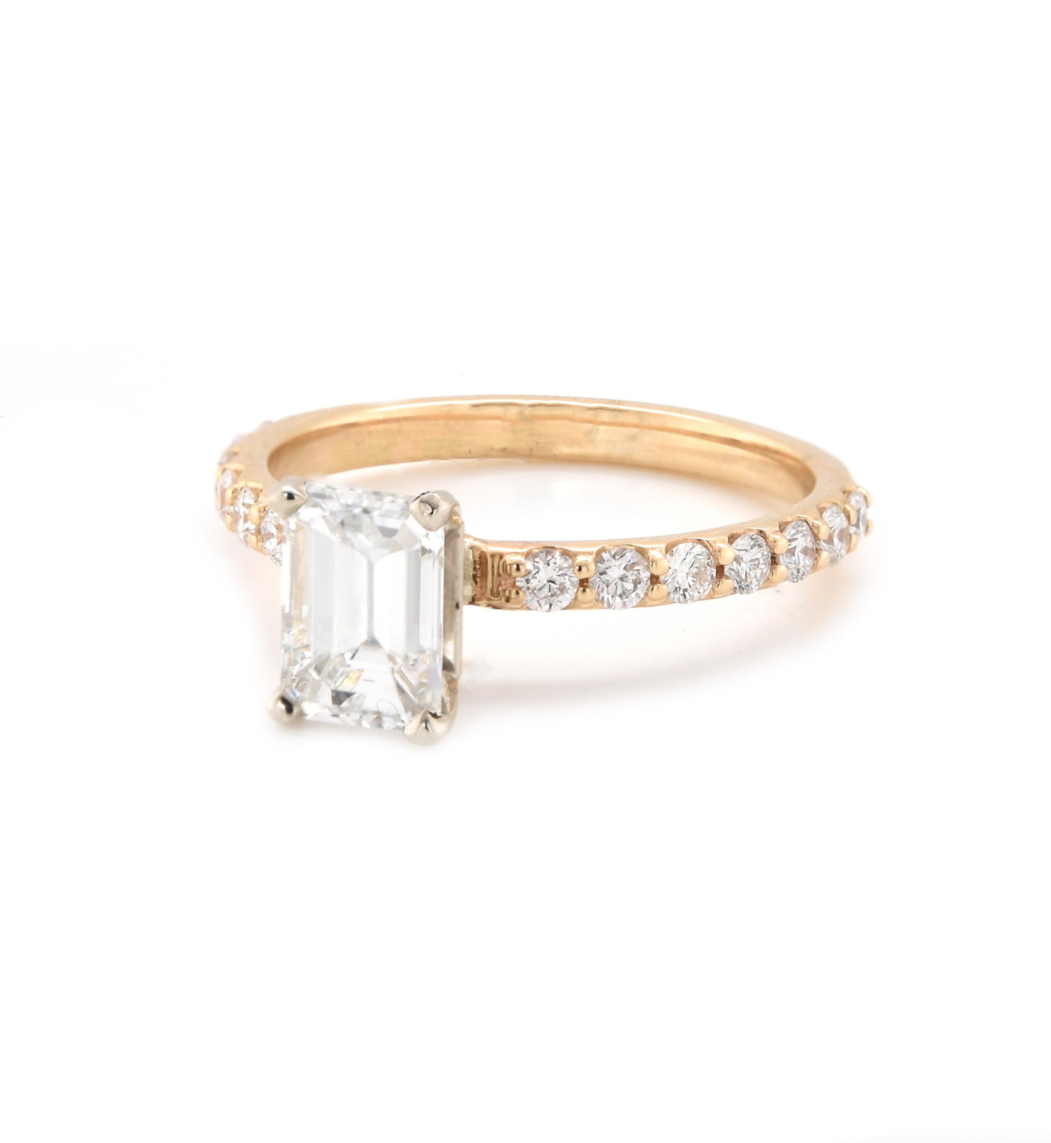 Designer: custom
Material: 14K yellow gold
Diamond: 1 emerald cut = 1.16ct
Color: D
Clarity: VVS2
GIA: 2135110778
Diamonds: 14 round brilliant cut = .42cttw
Color: G
Clarity: VS2
Ring Size: 7 (please allow up to 2 additional business days for sizing