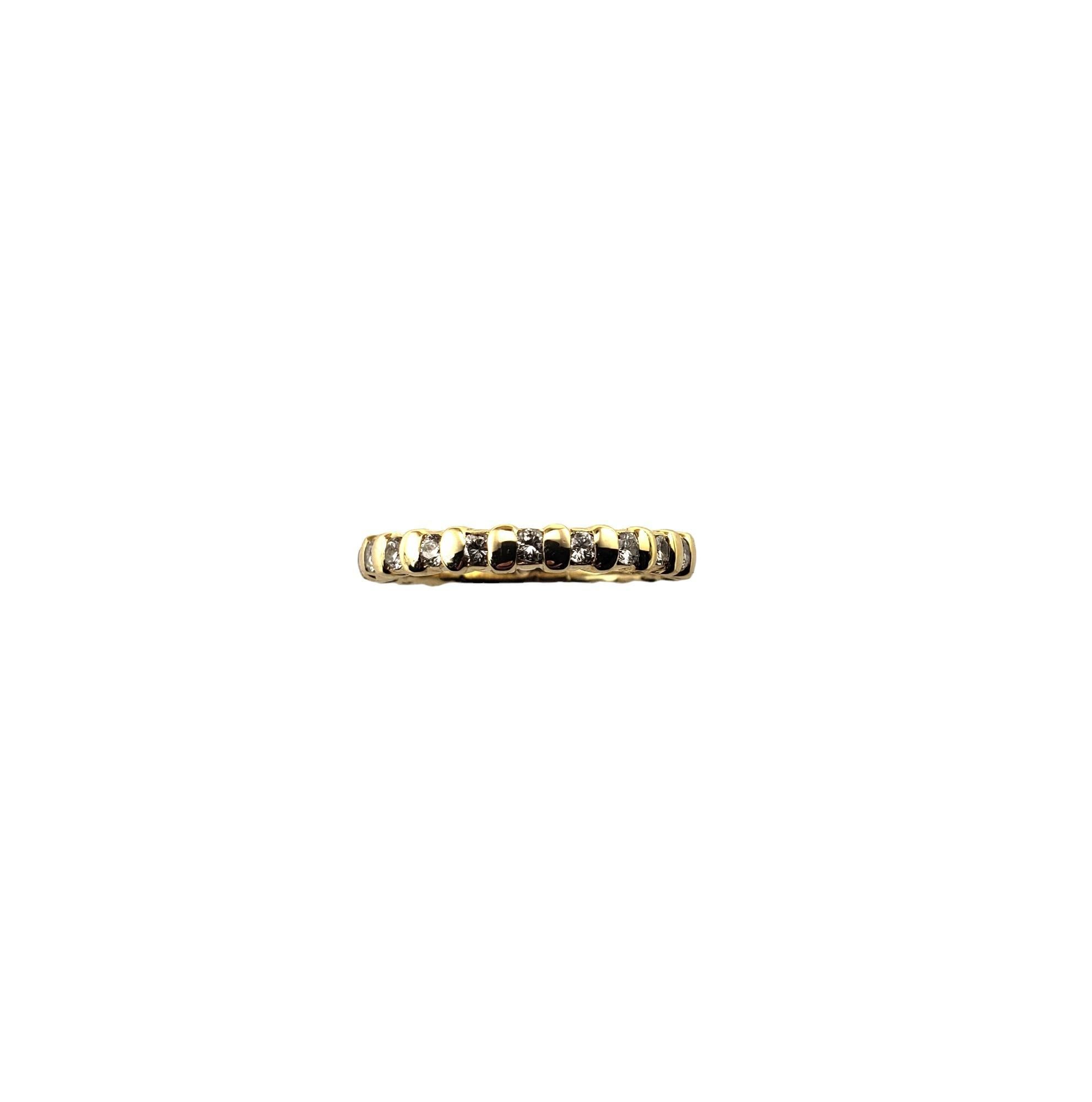 Vintage 14 Karat Yellow Gold Diamond Eternity Band Size 6-

This sparkling band features 22 round brilliant cut diamonds set in beautifully detailed 14K yellow gold.  Width: 2.5 mm.

Approximate total diamond weight:   .44 ct.

Diamond clarity:
