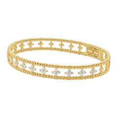 14 Karat Yellow Gold Diamond Floral Station Bangle Bracelet