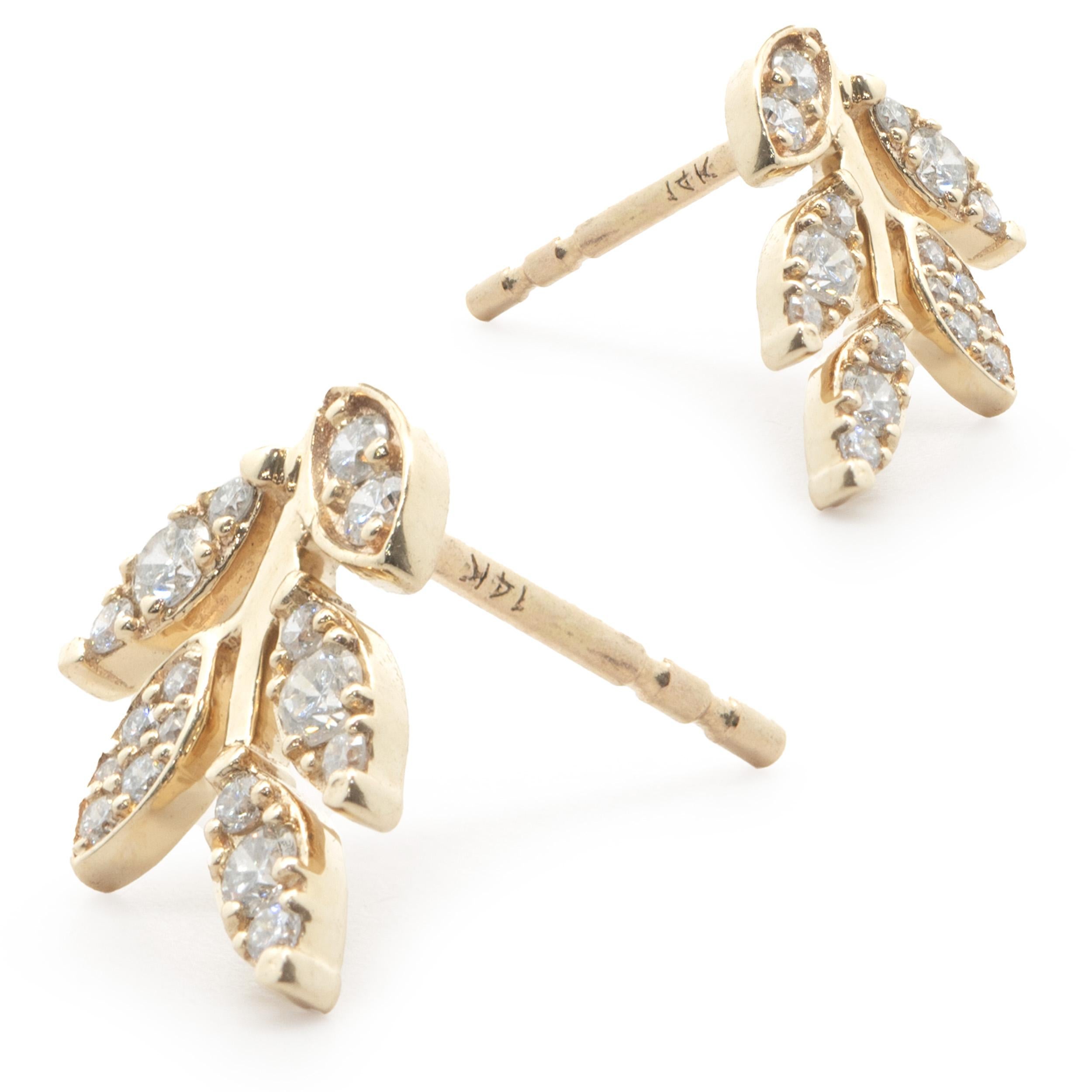 Designer: custom
Material: 14K yellow gold
Diamond: round brilliant cut = 0.28cttw
Color: G 
Clarity: SI1
Weight: 1.48 grams
