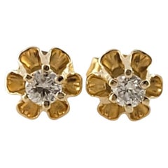 Clous d'oreilles fleur en or jaune 14 carats et diamants #17714