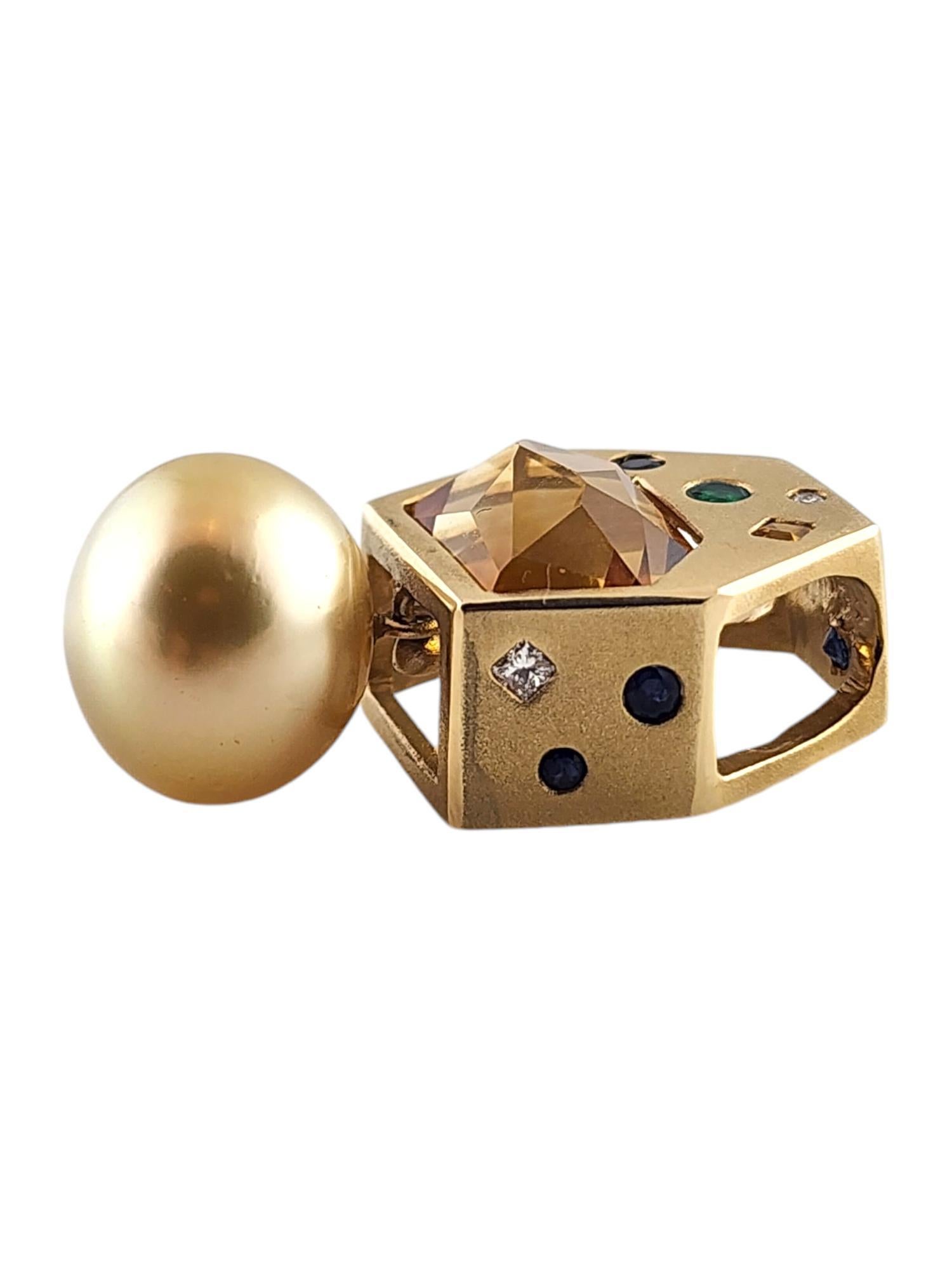 14 Karat Yellow Gold Diamond, Gemstone, & Cultured Pearl Pendant

This beautiful 14K yellow gold pendant features a stunning dangling cultured golden south sea pearl as well as one fancy shaped cut citrine quartz in the center! Surrounding the