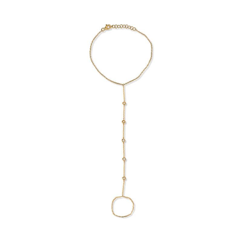 Dieses Handgelenkarmband besteht aus fünf in 14 Karat Gelbgold gefassten Diamanten. Karabiner-Verschluss. 
Maße: Armband Länge 6 