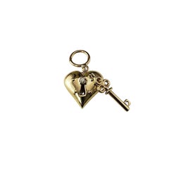 Charm con cuore e chiave in oro giallo 14 carati #21817