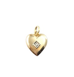 Relicario de oro amarillo de 14 quilates con diamantes #21481