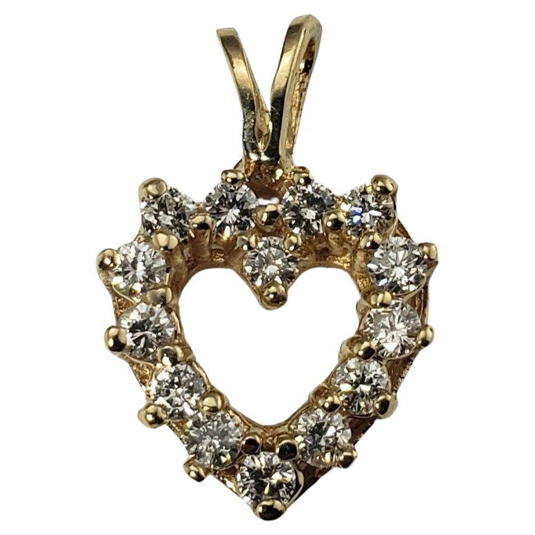 14 Karat Yellow Gold Diamond Heart Pendant For Sale