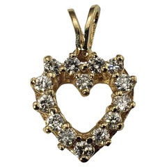 Pendentif en forme de cœur en or jaune 14 carats et diamant
