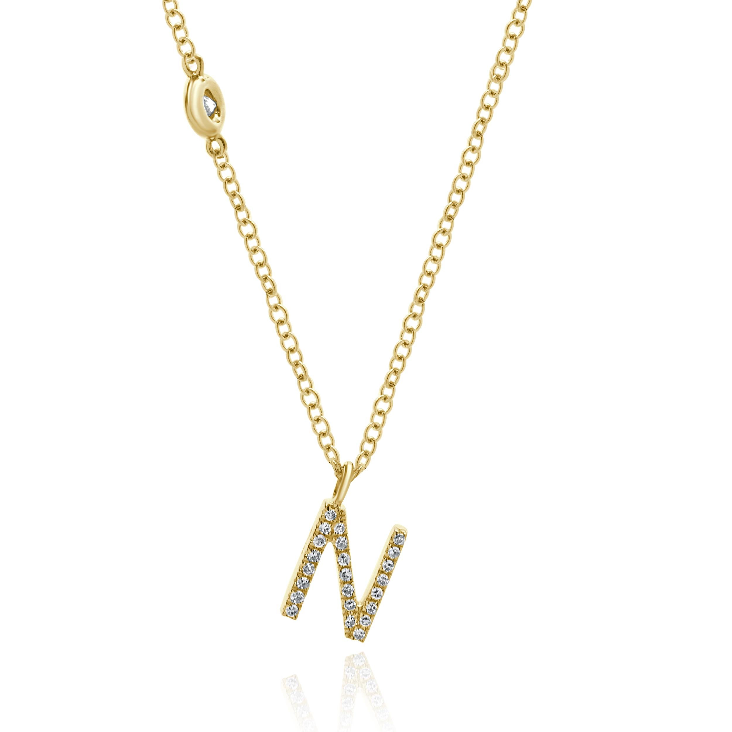 Designer: custom
Material: 14K yellow gold
Diamonds: round brilliant cut = 0.11cttw
Color: G 
Clarity: SI1
Dimensions: necklace measures 18-inches in length
Weight: 1.89 grams