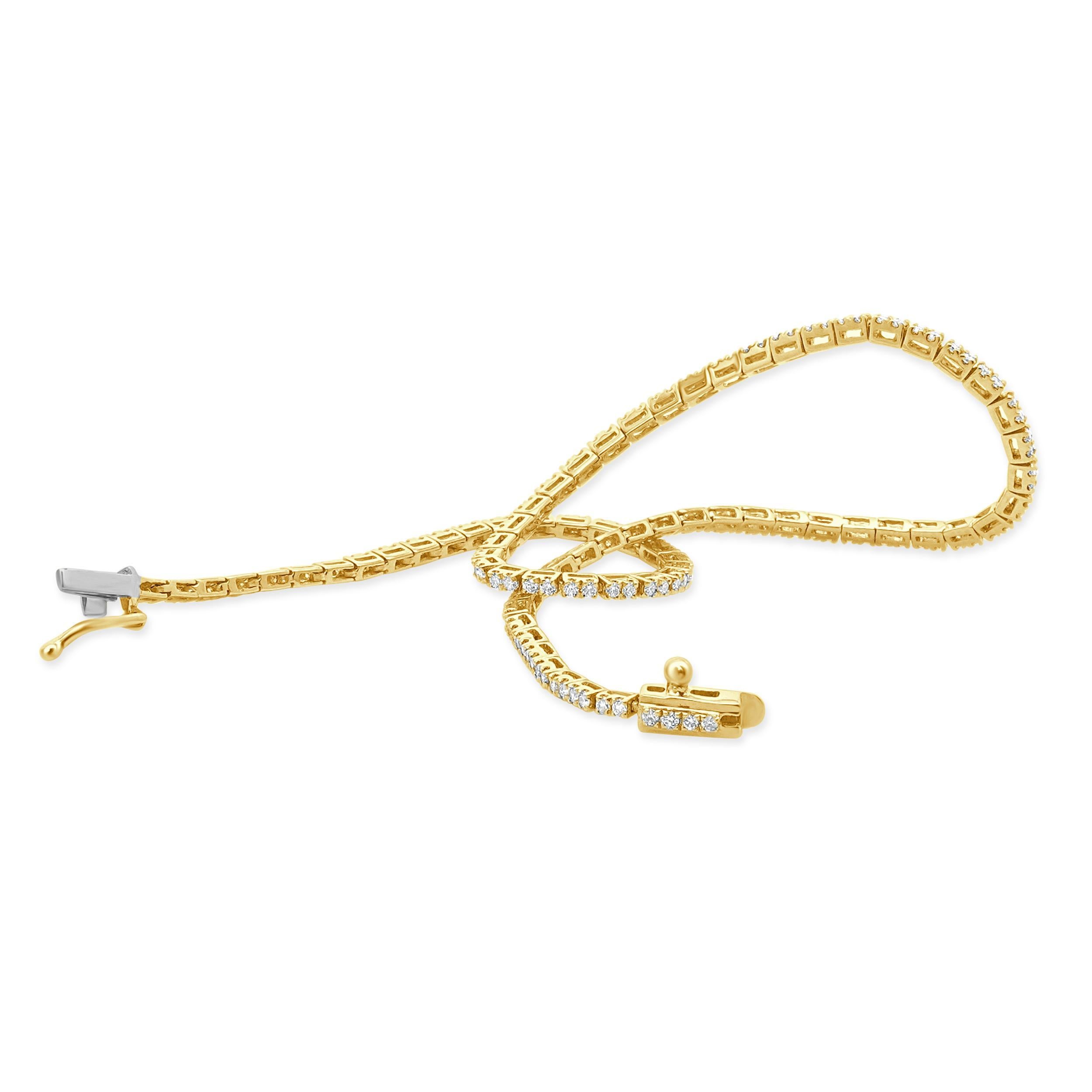 Designer: custom design
Material: 14K yellow
Diamonds: round cut = 0.69cttw
Color: H 
Clarity: SI2
Dimensions: bracelet will fit up to a 7 -inch wrist
Weight: 2.93 grams