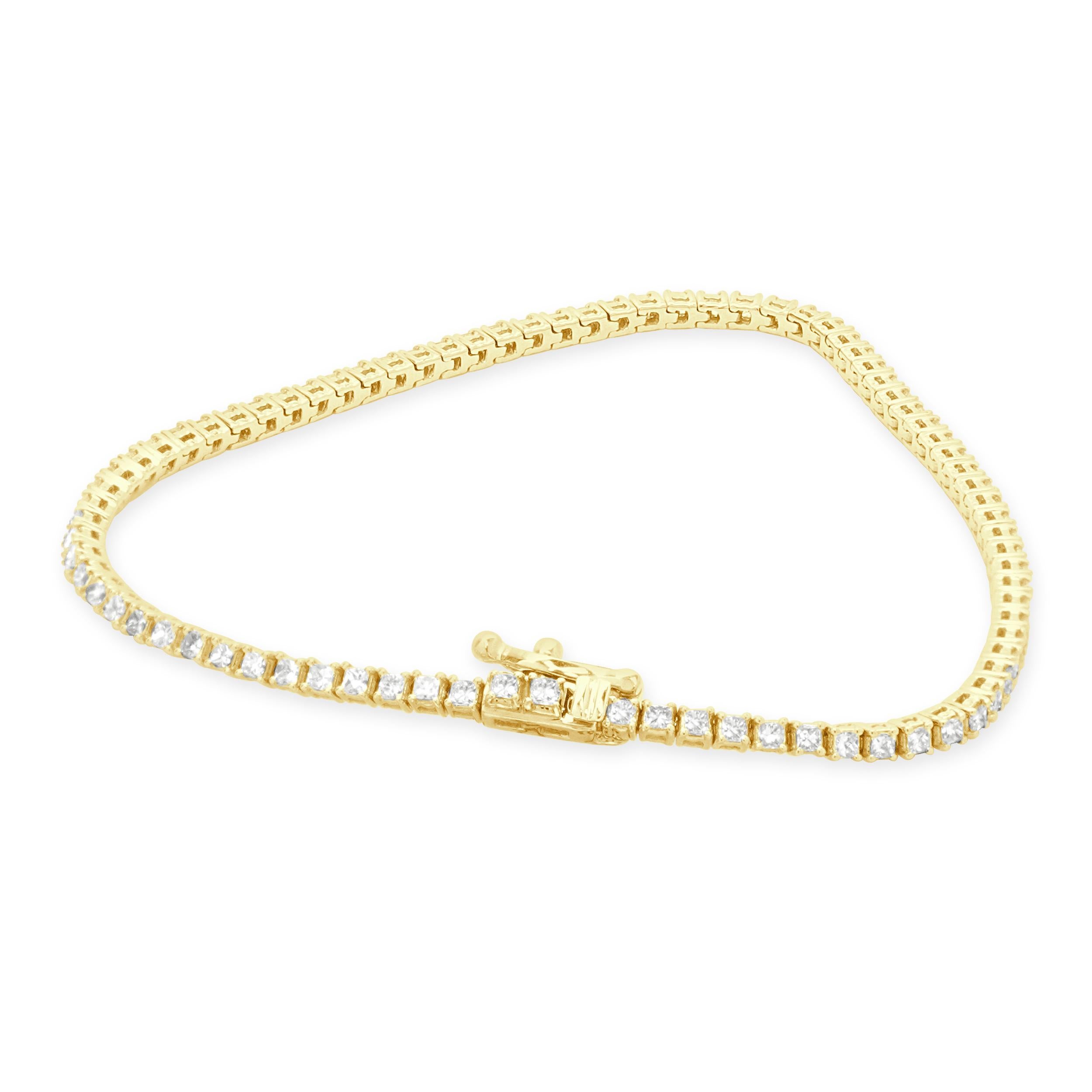 Designer: custom design
Material: 14K yellow
Diamonds: round cut = 1.58cttw
Color: H / I
Clarity: SI1-2
Dimensions: bracelet will fit up to a 7 -inch wrist
Weight: 6.01 grams