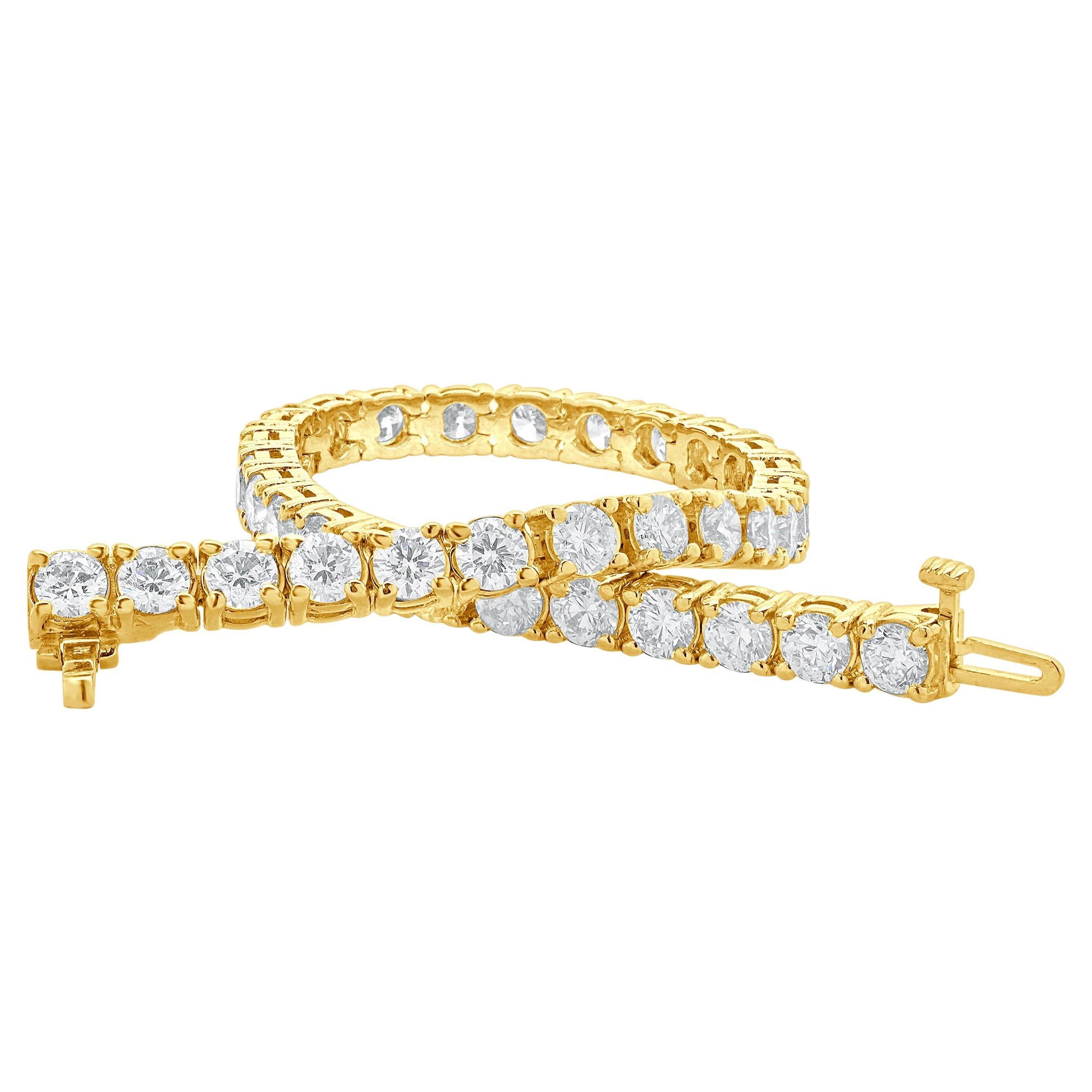 Designer : design personnalisé
Matériau : Or jaune 14K
Diamant : taille ronde brillante = 11,75cttw
Couleur : G / H
Clarté : VS2-SI1
Dimensions : le bracelet convient à un poignet de 7.5 pouces maximum.
Poids : 18,98 grammes
