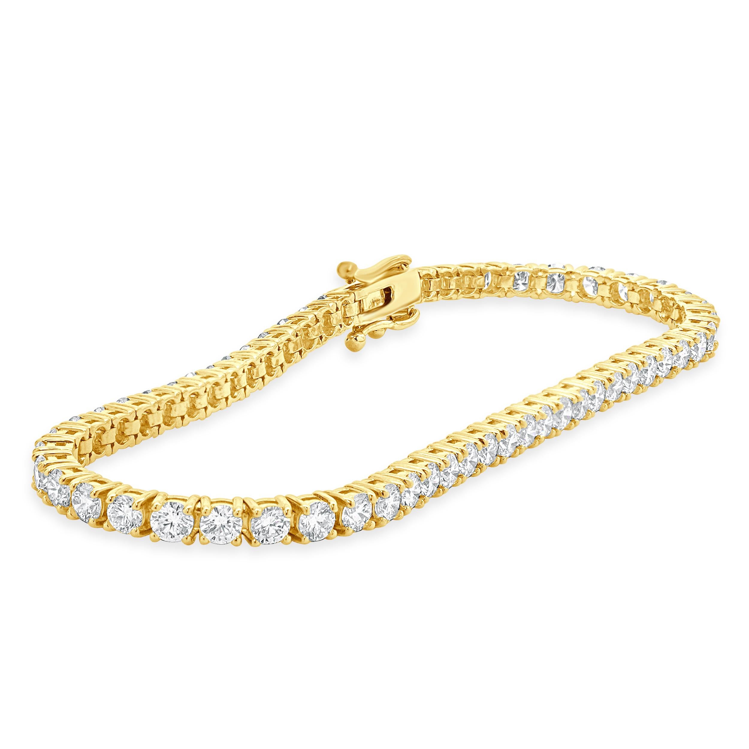 Designer : design personnalisé
Matériau : Or jaune 14K
Diamant : taille ronde brillante = 5,00cttw
Couleur : G / H
Clarté : SI1
Dimensions : le bracelet convient à un poignet de 7 pouces maximum.
Poids : 8.45 grammes

