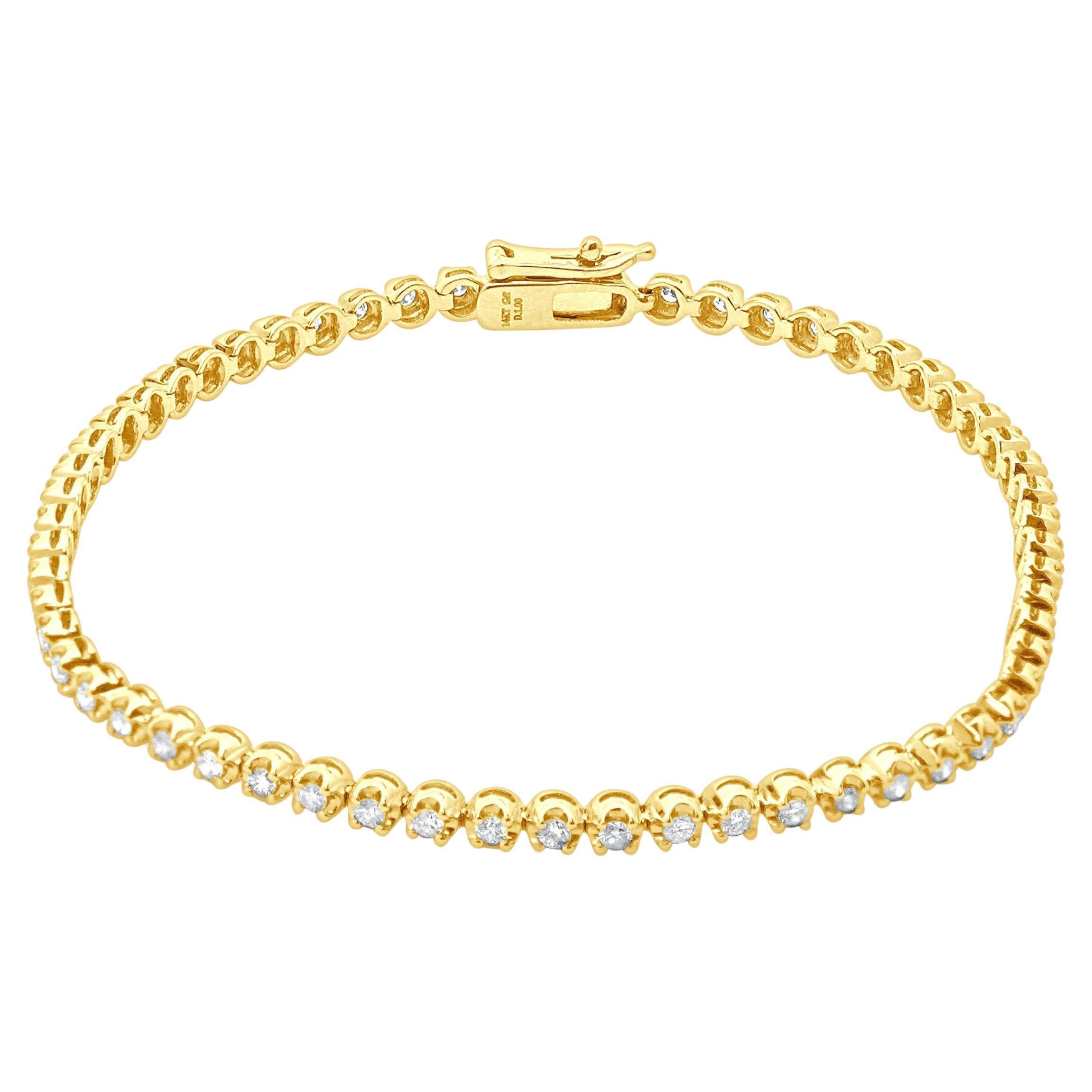 Diseñador: diseño personalizado
Material: Amarillo 14K
Diamantes: talla redonda = 1,00ctw
Color: H 
Claridad: SI2
Dimensiones: la pulsera se ajusta a una muñeca de hasta 7 pulgadas
Peso: 5.58 gramos