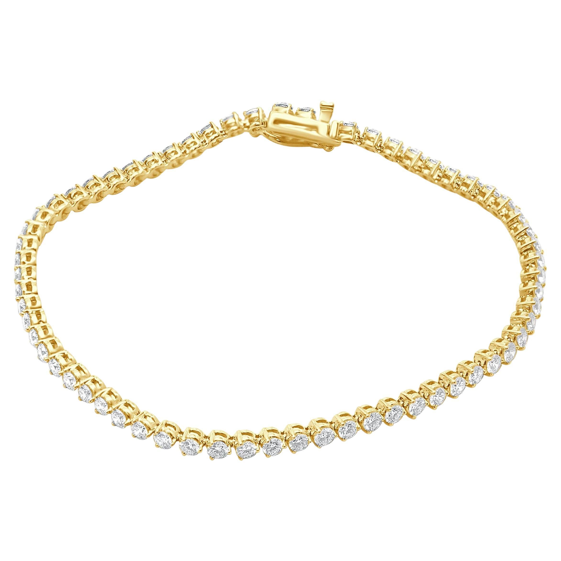 Designer: design personalizzato
Materiale: Giallo 14K
Diamanti: taglio rotondo = 2,74cttw
Colore: I
Chiarezza: SI1-2
Dimensioni: il braccialetto si adatta a un polso di 7 pollici.
Peso: 5.99 grammi