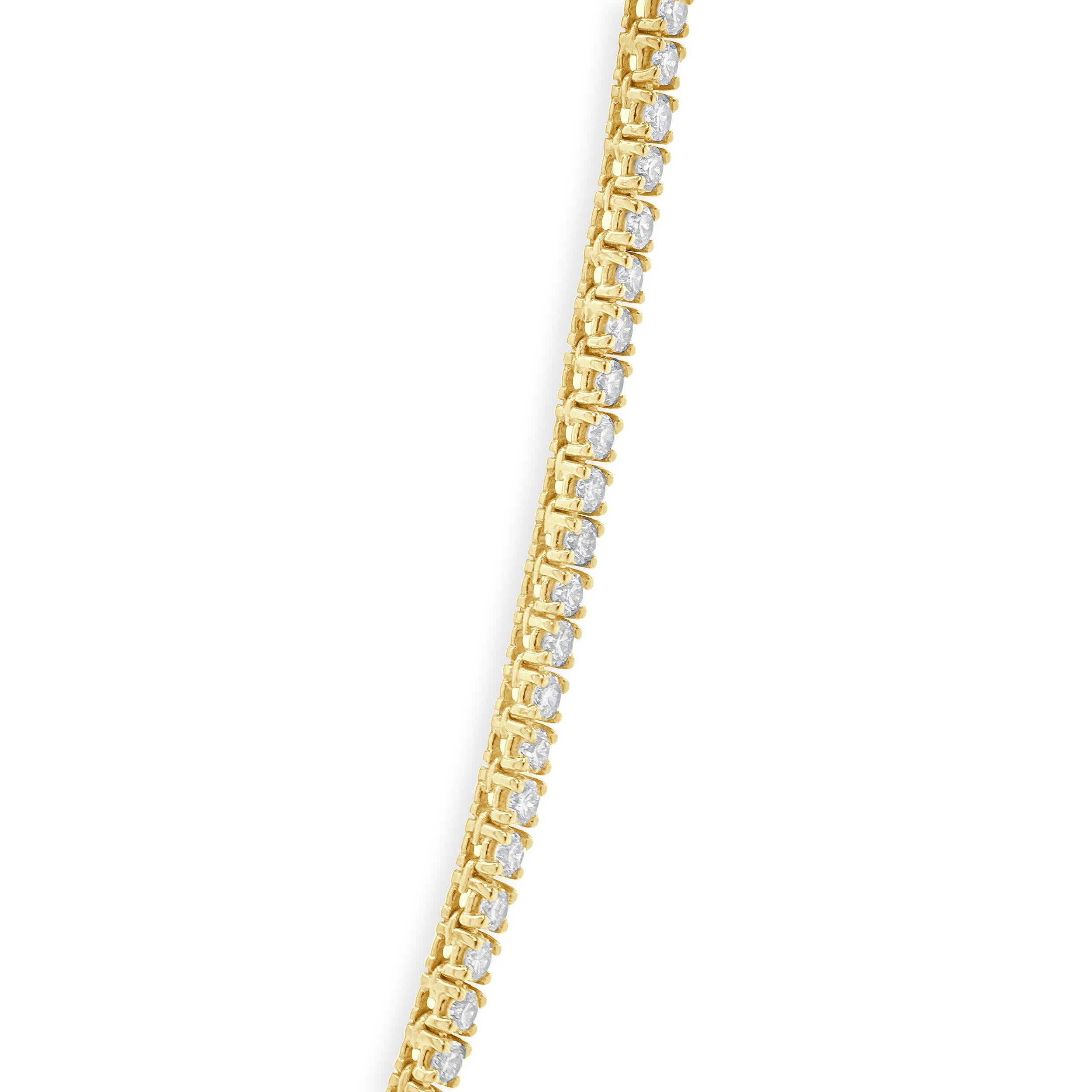 Designer: custom
Material: 14K yellow gold
Diamonds: 144 round brilliant cut = 14.00cttw
Color: G / H/I
Clarity: SI1
Dimensions: necklace measures 18.75-inches in length
Weight: 34.17 grams
