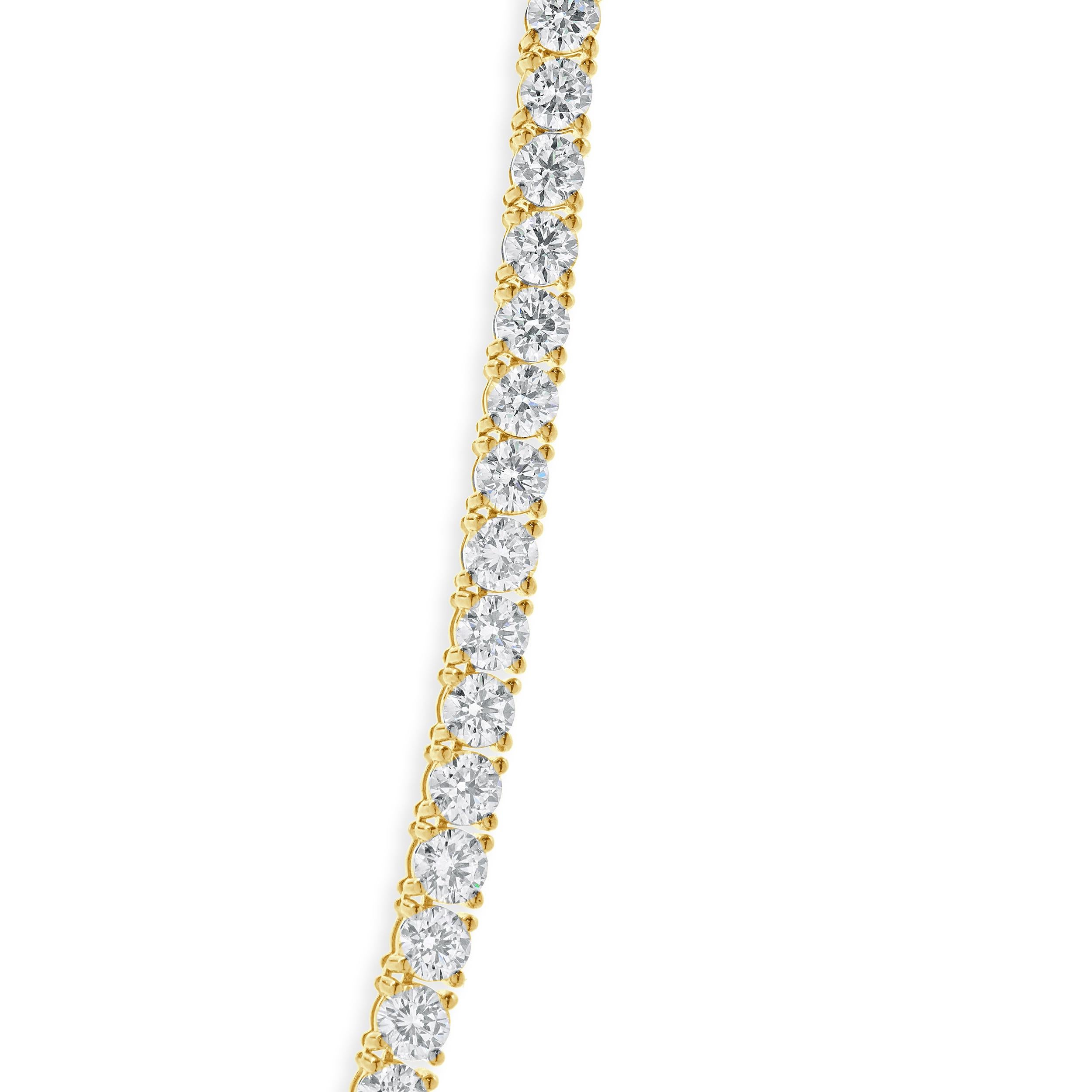 Designer: design personalizzato
Materiale: oro giallo 14 carati
Diamante: 104 tagli rotondi a brillante = 25,30cttw
Colore: G. H.
Chiarezza: VS-SI1
Dimensioni: la collana misura 17 pollici di lunghezza
Peso: 29,52 grammi