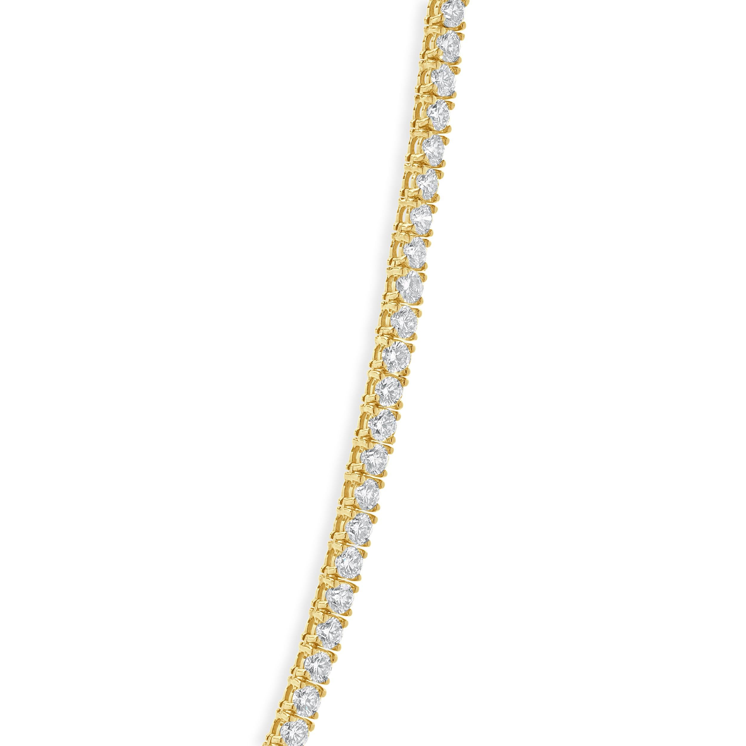 Designer: design personalizzato
Materiale: oro giallo 14 carati
Diamante: 144 tagli tondi a brillante = 26,75cttw
Colore: G. H.
Chiarezza: VS-SI1
Dimensioni: la collana misura 22 pollici di lunghezza
Peso: 34.50 grammi

