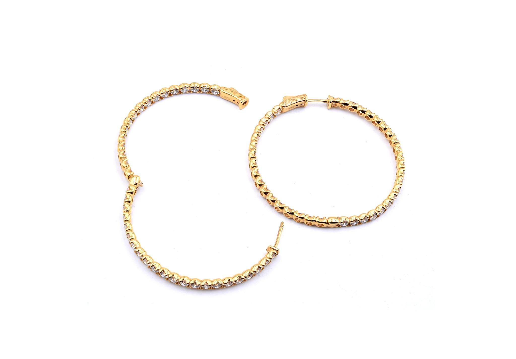 Material: 14K yellow gold
Diamonds: 78 round brilliant cuts = 7.80cttw
Color: G
Clarity: VS
Dimensions: earrings measure 2-inches long 
Fastenings: snap closure with lever
Weight: 15.81 grams