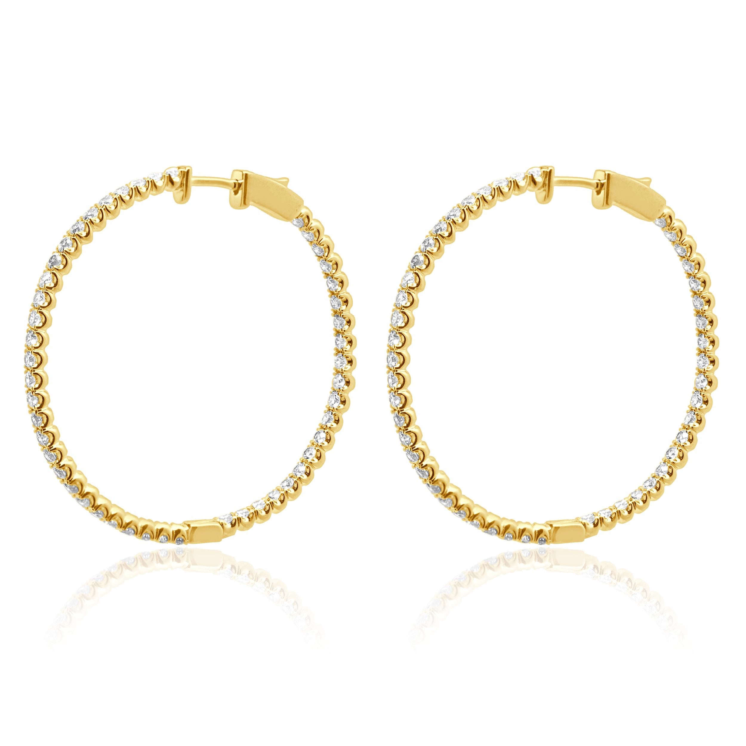 Designer : design personnalisé
Matériau : Or jaune 14K
Diamants : 96 diamants ronds de taille brillant = 2.60cttw
Couleur : G 
Clarté : SI1
Dimensions : les boucles d'oreilles mesurent 38 mm de long
Poids : 7.34 grammes
