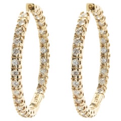 Pendientes de aro con interior y exterior de diamantes en oro amarillo de 14 quilates