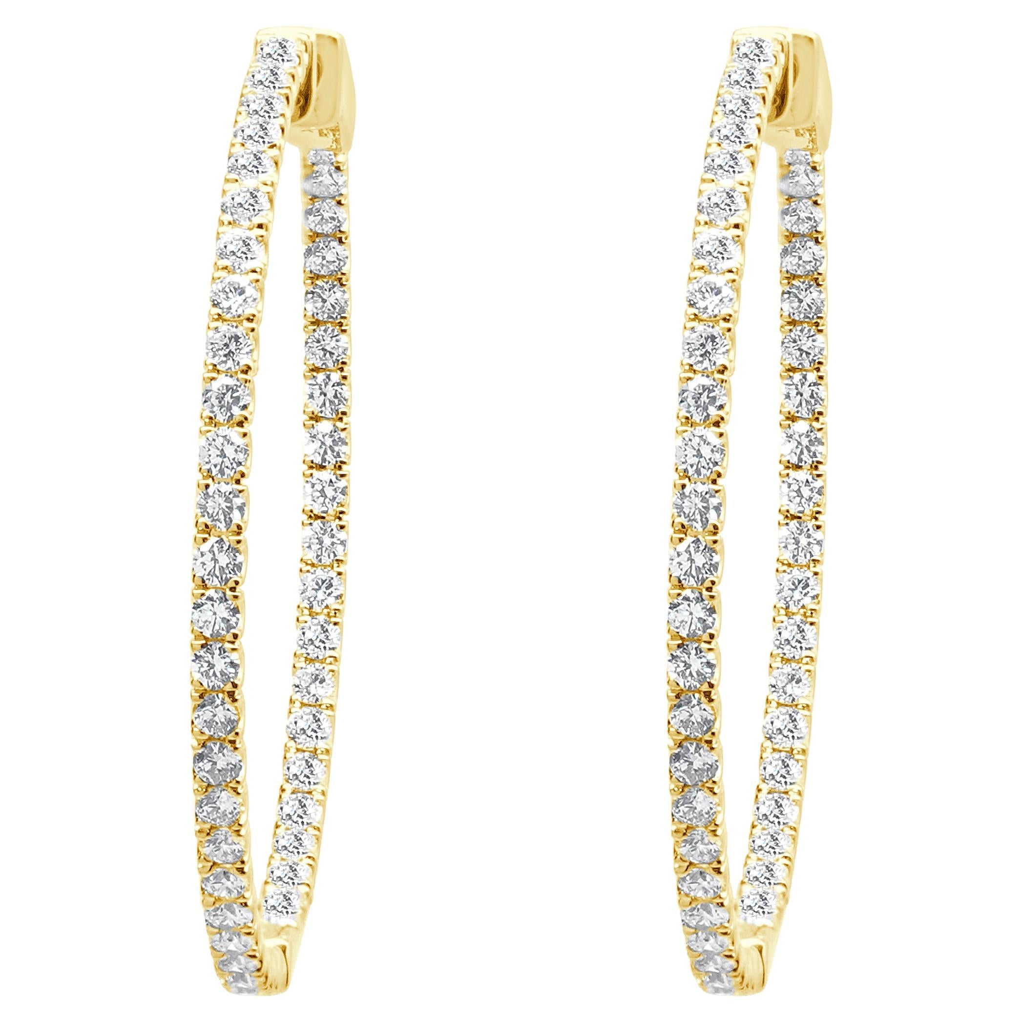 Pendientes de aro con interior y exterior de diamantes en oro amarillo de 14 quilates