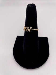 Bague feuille en or jaune 14 carats et diamants