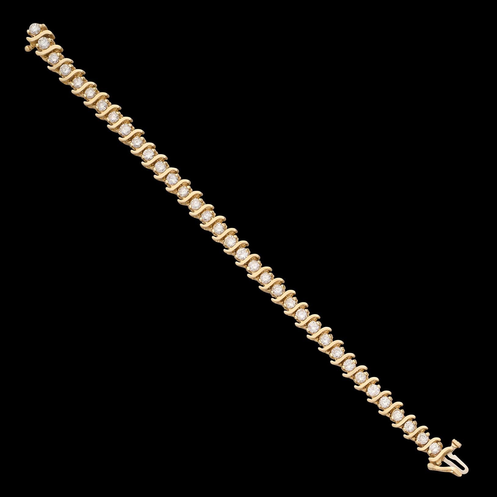 Round Cut 14 karat Yellow Gold Diamond Line Bracelet For Sale
