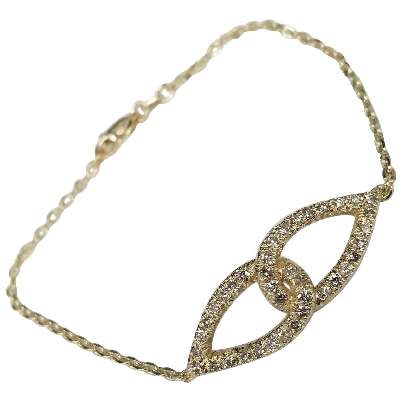 14 Karat Yellow Gold Diamond "Love Knot" Bracelet For Sale