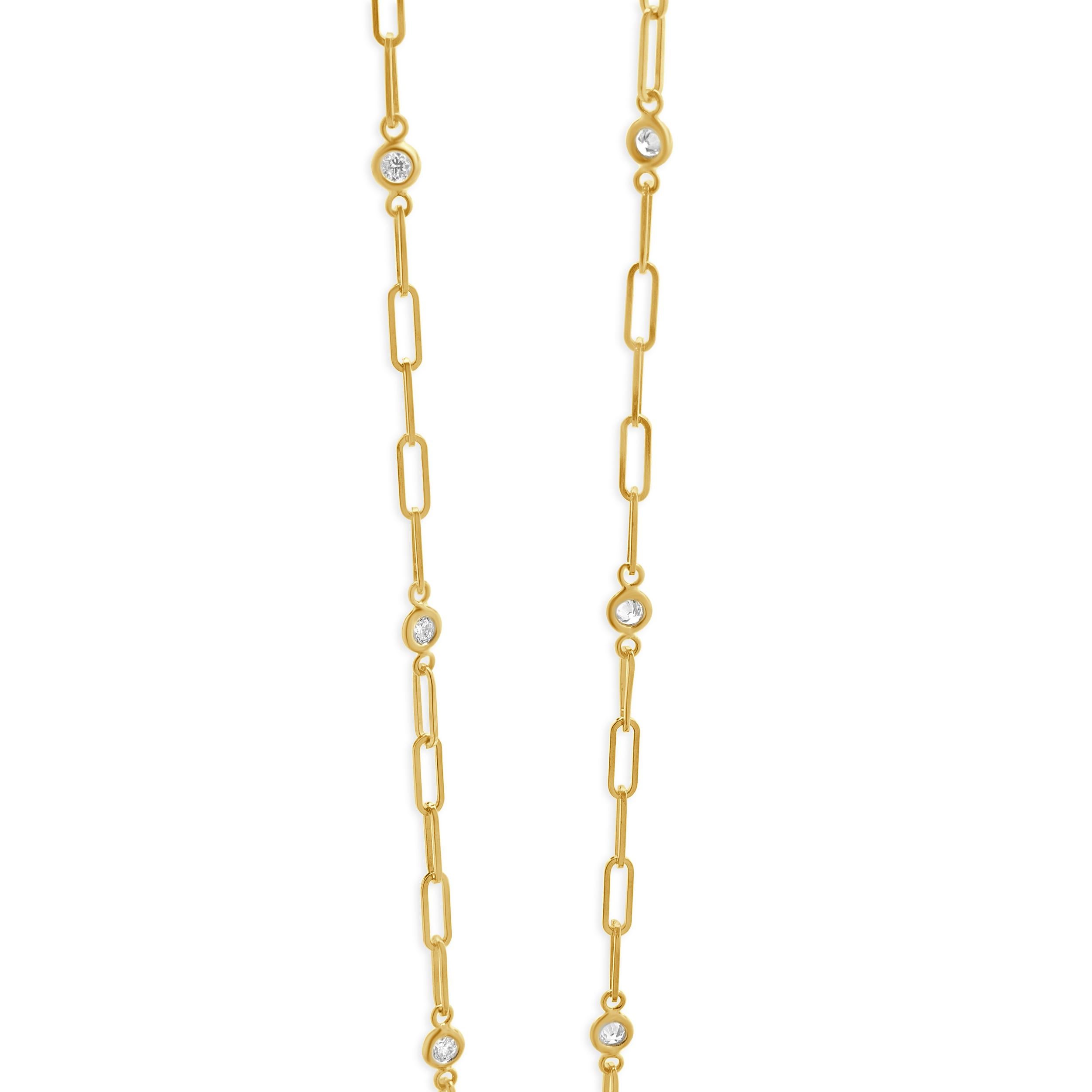 Designer: custom
Material: 14K yellow gold
Diamonds: 13 round brilliant cut = 0.50cttw
Color: G
Clarity: SI1
Dimensions: necklace measures 18-inches in length
Weight: 3.76 grams
