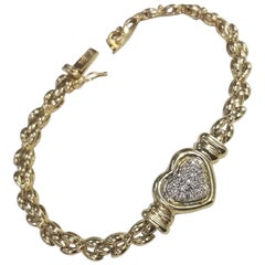Bracciale con cuore in oro giallo 14 carati con pave di diamanti su A Link