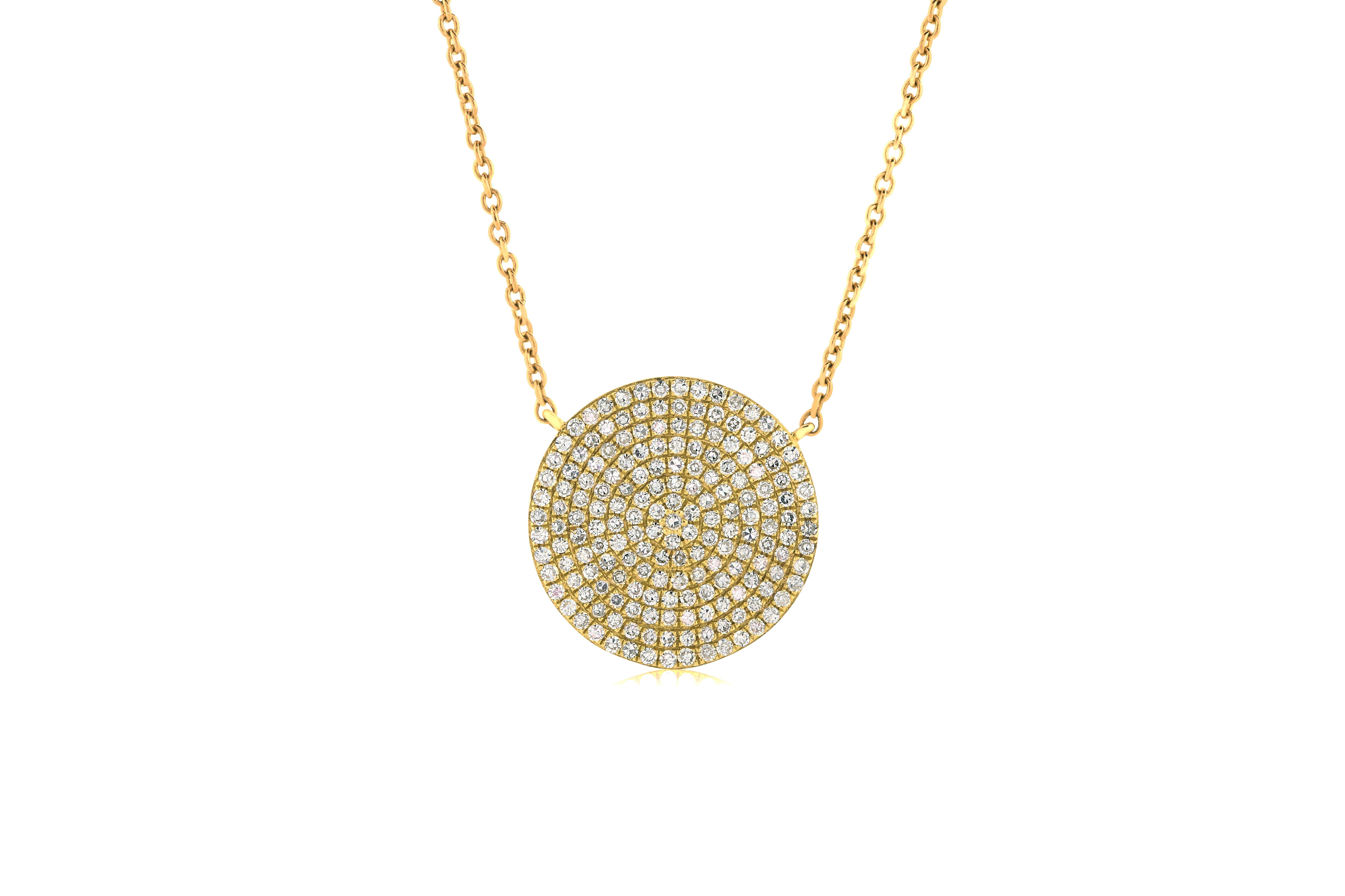 This pave diamond pendant necklace features 0.57 carats of diamonds set in 14K yellow gold. Adjustable length closure. 